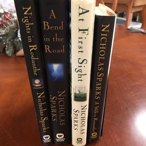 Nicolas Spark’s 4 Pc book set - 1 autographed
